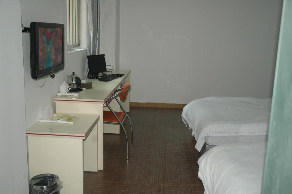 Guangyue Hotel Cantón Habitación foto
